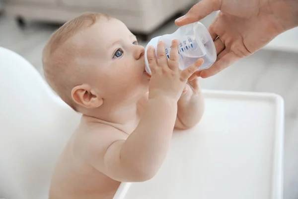 depositphotos_131691502-stock-photo-mother-giving-to-drink-water